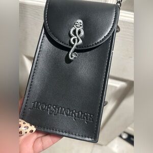 Crossbody bag featuring the Dark mark with Morsmordre.  🧙